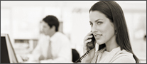 phone operator at computer desk